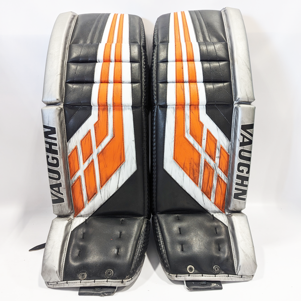 Vaughn Velocity VE8 - Used NCAA Pro Stock Goalie Pads (Black/Orange/Grey)