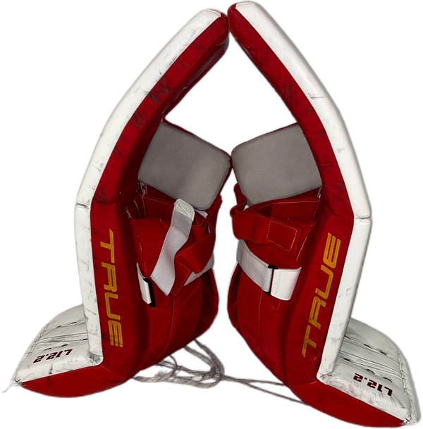 TRUE L12.2 - Used Pro Stock Goalie Pads (White/Red/Yellow)